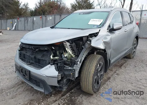 2019 Honda Cr-V Touring z USA, uszkodzony, nr VIN 2HKRW2H96KH604100